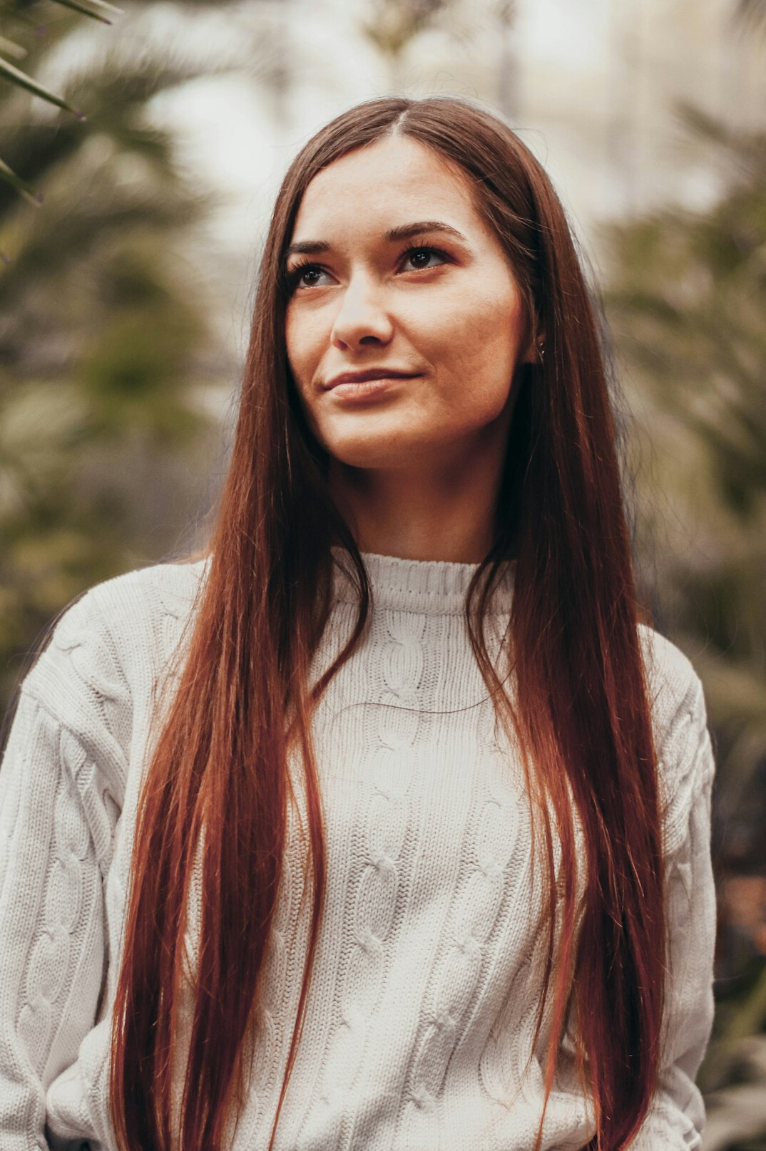 Portrait of a smiling female mentor with straight hair