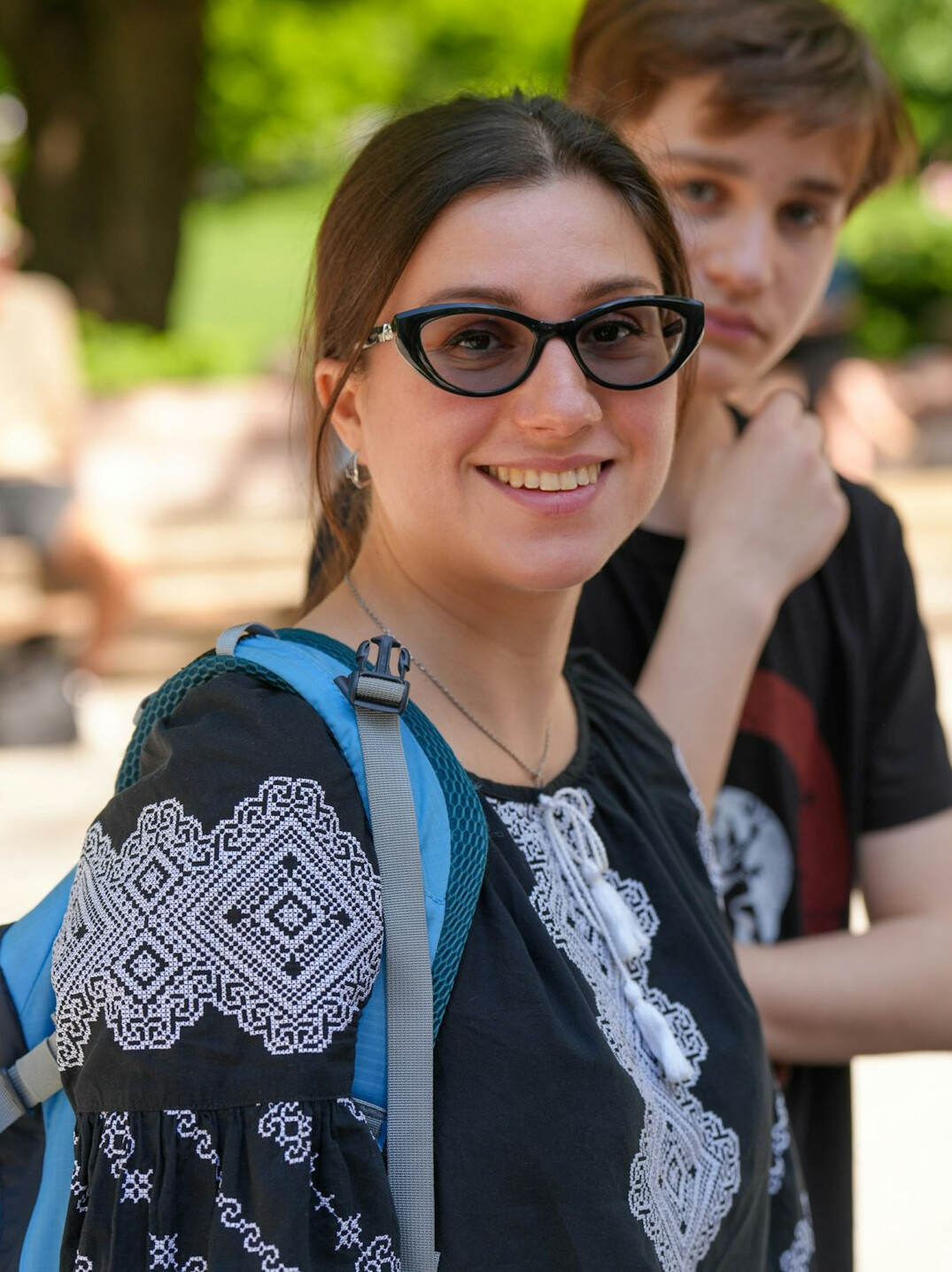 Portrait of a smiling female mentor with glasses