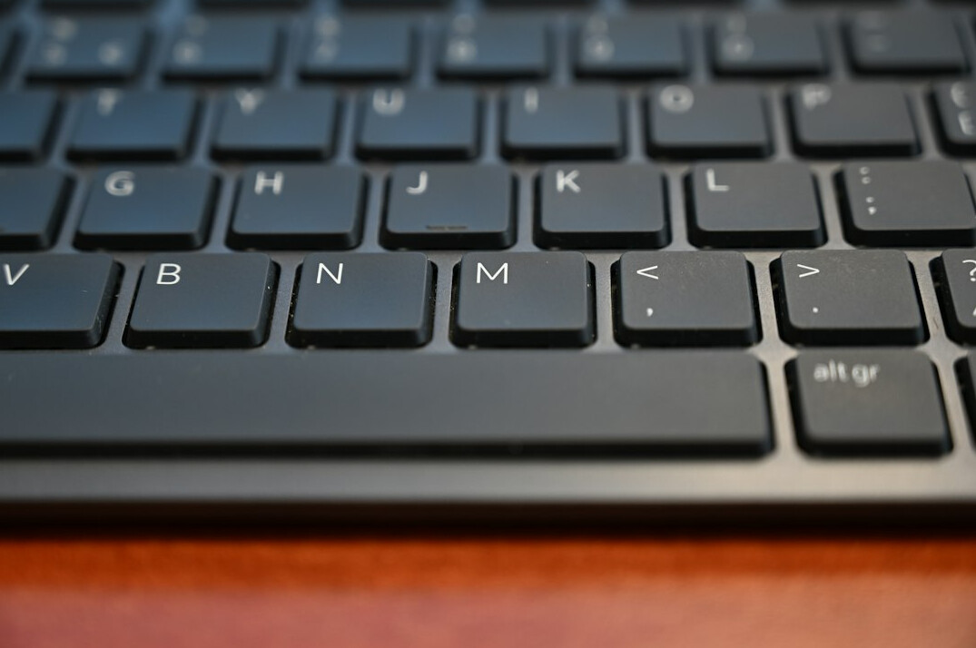 beginner typing on keyboard